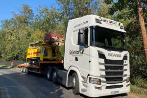 salvatori lowloader trailer carrying digger