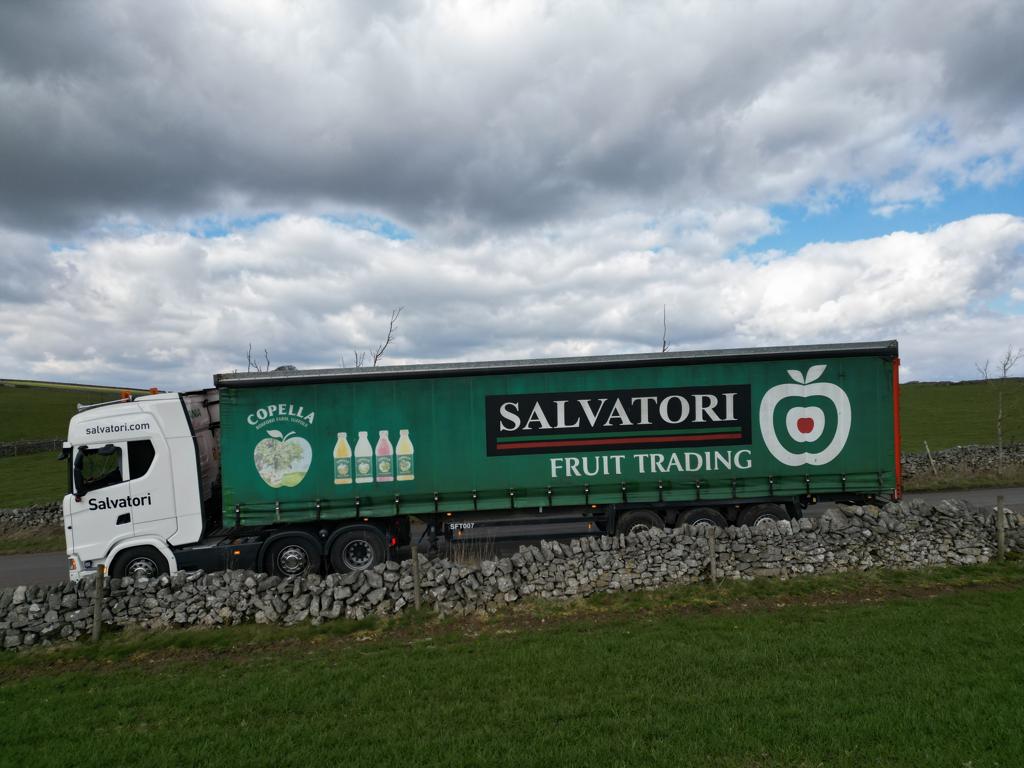 Salvatori truck with curtain sided trailer on the way to delivery