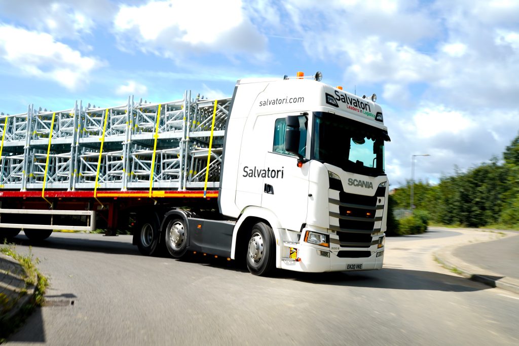 Salvatori FORS Gold flatbed trailer with construction material.